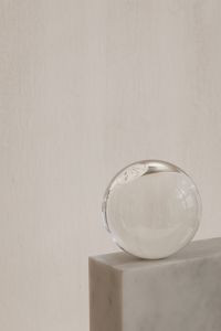 Kaboompics - Glass Spheres and Marble Arch on Stone Surface