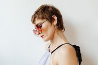 Kaboompics - Rainbow Body Paint on a Woman's Neck and Chest, Side Profile