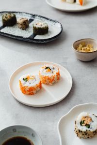 Japanese Sushi Assortment with Nigiri, Maki Rolls and Soy Sauce