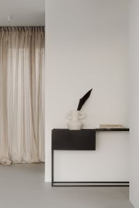 Kaboompics - Black Floating Console with Dried Botanical Decor