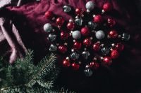 Kaboompics - Red and Silver Christmas Baubles with Twine and Evergreen Branches