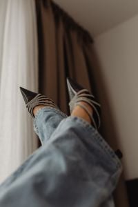 Kaboompics - Black Rhinestone Strap Pumps Paired with Blue Jeans