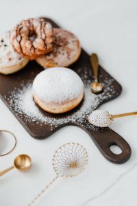 Kaboompics - Homemade Raspberry Polish Paczki Donut with Powdered Sugar