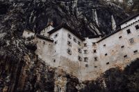 Kaboompics - Predjama castle at the cave mouth in Postojna, Slovenia