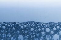 Kaboompics - Blue Soap Bubble Border Along the Bottom with Wide Pale Blue Copy Space, Horizontal Background