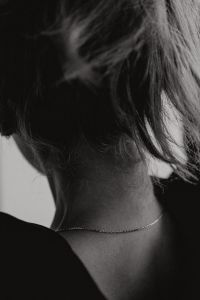 Kaboompics - Monochrome Back Neck with Delicate Chain Necklace