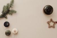 Kaboompics - Beige Christmas Flat Lay Background with Fir Branch, Paper Ornaments and Gold Star Decoration