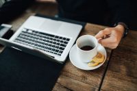 Kaboompics - Young Entrepreneur Working with cup of tea