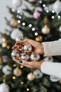 Kaboompics - Close-Up of Hands Holding Silver Baubles