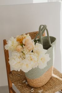 Kaboompics - Close-Up White Flower Bouquet in Woven Tote on Chair