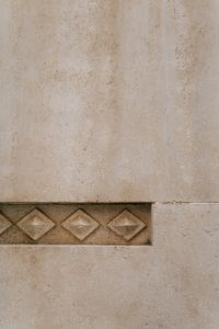 Kaboompics - Neutral Stone Wall with Diamond Tile Border