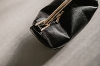 Kaboompics - Black Leather Handbag with Gold Handle Close-Up