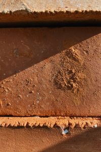 Kaboompics - Terracotta Brick Texture with Strong Diagonal Shadow