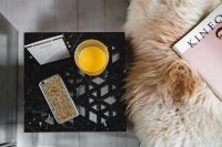 Kaboompics - Bedside table, iPhone mobile, Kinfolk magazine and cup of orange juice