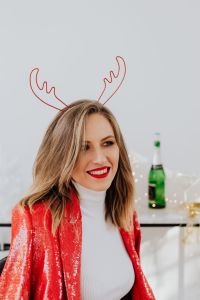 Kaboompics - Smiling Woman in Antler Headband at a New Year's Eve Party
