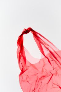 Kaboompics - Red Plastic Bag Isolated On White Background Pollution Visual
