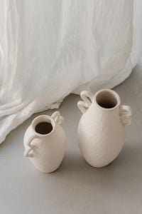 Kaboompics - Two Ceramic Vases and Coffee on White Bedding