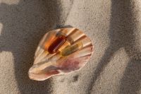 Kaboompics - Vitamin Capsules in a Shell on Sandy Beach