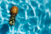 Kaboompics - Pineapple in a swimming pool