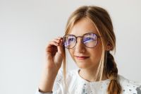 Kaboompics - Schoolgirl Wearing Corrective Glasses at Home