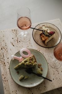 Kaboompics - Dessert Spread with Wine and Cake on a Coffee Table