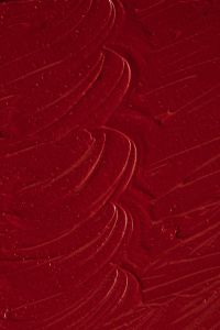 Kaboompics - Burgundy Lipstick Texture with Soft Curved Smears