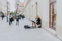 Kaboompics - Street Performer in Horse Mask Playing Piano, Krakow