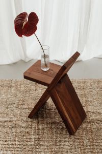 Kaboompics - Blooming Flower in Vase on Wooden Chair - A Charming Still Life Collection