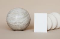 White Business Card Mockup with Stone Sphere and Ribbed Ceramic Vase, Neutral Brand Background