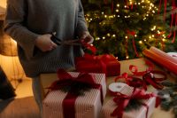 Kaboompics - Christmas Wrapping Supplies and Evergreen Branches Flat Lay