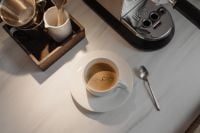 Kaboompics - White Espresso Cup on a Marble Coffee Bar Counter