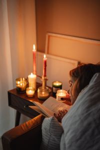 Kaboompics - Stay-at-Home Reading with Cozy Candles