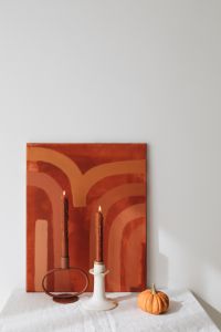 Kaboompics - Terracotta Wall Art, Taper Candles and Mini Pumpkin in Autumn Still Life