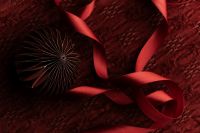 Kaboompics - Close Up Red Wrapped Gift with Ribbed Ribbon