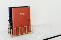 Kaboompics - 2020 Planner and Calendar Books on White Marble with Copy Space