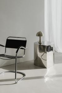 Kaboompics - Chrome-Frame Chair and Dome Lamp by Sheer Curtains