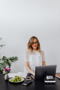 Kaboompics - Businesswoman Working on Laptop at Office Desk