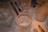 Kaboompics - Crystal Water Glasses and Gold Cutlery on Tablecloth