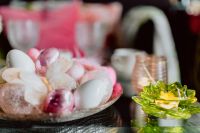 Kaboompics - Pink and White Easter Egg Ornaments beside a Green Flower-Shaped Tealight Holder