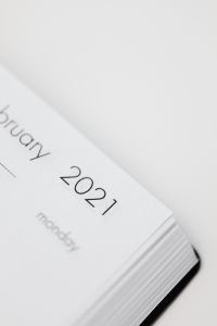 Kaboompics - Macro Crop of 2021 Date on a White Planner Calendar