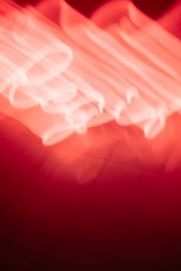 Kaboompics - Vertical Red Neon Light Trails Over Dark Wall