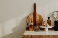 Kaboompics - Neutral Kitchen Counter Still Life with Ceramic Teapot, Stacked Cups and Copy Space
