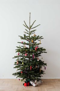 Kaboompics - Small Decorated Christmas Tree in Minimal Interior