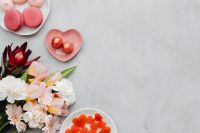 Kaboompics - Romantic Flatlay With Spring Flowers, Heart Chocolates, and Gummies