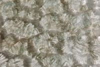 Kaboompics - High-Contrast Ribbed Glass Texture with Intersecting Faceted Edges