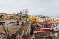 Kaboompics - Dense Naples Rooftops With Satellite Dishes and the Bay in the Distance
