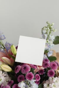 Kaboompics - Blank Card Mockup with Pastel Flowers and Generous Copy Space