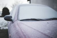 Kaboompics - Frost on a red car