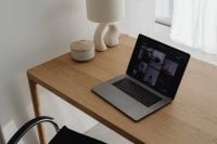Kaboompics - Minimalist Laptop Workspace With Open Book And White Mouse