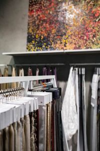 Kaboompics - Collection of design fabrics on hangers